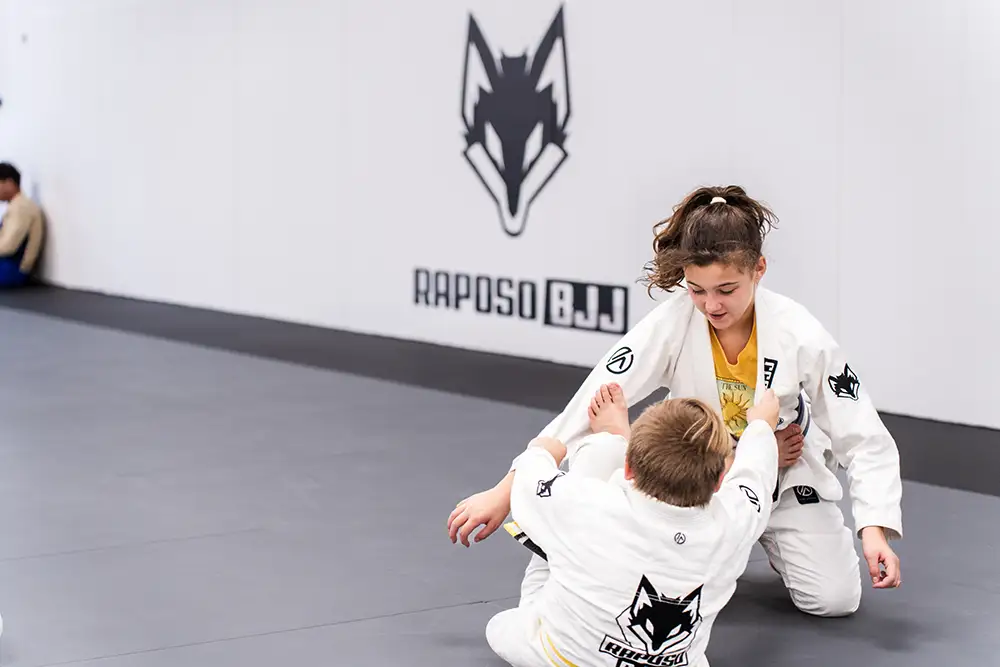 2 students training the best kids jiu jitsu program at Raposo BJJ Academy in Slidell LA